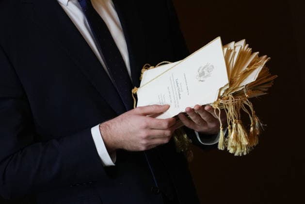 July 28, 2026, Washington, District Of Columbia, USA: A person hands out ceremony programs ahead of a Congressional Tribute to late US Senator Lindsey Graham (Republican of South Carolina) in the Rotunda of the United States Capitol in Washington, DC, USA,, July 28, 2026 Washington USA - ZUMAs152 20260728_faa_s152_014 Copyright: xNathanxHowardx-xPoolxviaxCNPx