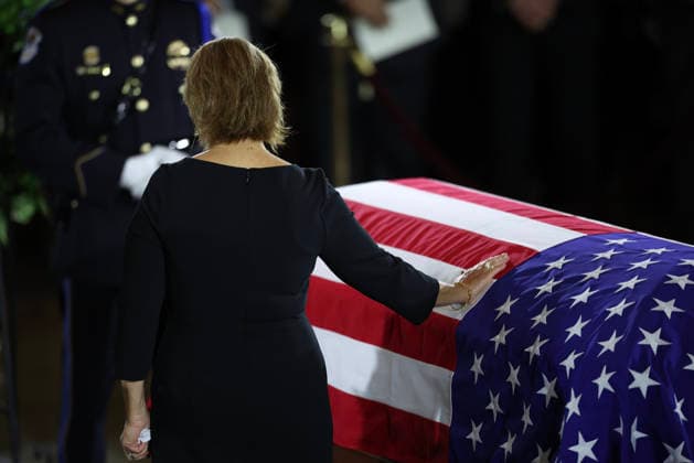 Lindsey Graham Memorial Service in the US Capitol WASHINGTON, DC - JULY 28: U.S. Sen. Darline Graham Nordone (R-SC) pays her respects over the casket during a memorial tribute for the late U.S. Sen. Lindsey Graham (R-SC) in the Rotunda of the U.S. Capitol on July 28, 2026 in Washington, DC. Graham, who was elected to the Senate in 2002, died suddenly on July 11th from an aortic dissection. He was 71 years old. Credit: Win McNamee Pool via CNP Washington District of Columbia United States of America EDITORIAL USE ONLY Copyright: xx GYI2288014206-6472014 WinxMcNameex-xPoolxviaxCNPx cnpphotos338239