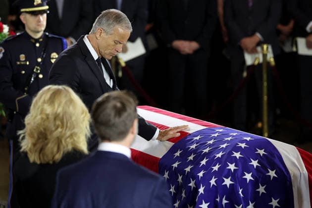 July 28, 2026, Washington, District Of Columbia, USA: WASHINGTON, DC - JULY 28: U.S. Sen. Majority Leader John Thune (R-SD) pays his respects over the casket during a memorial tribute for the late U.S. Sen. Lindsey Graham (R-SC) in the Rotunda of the U.S. Capitol on July 28, 2026 in Washington, DC. Graham, who was elected to the Senate in 2002, died suddenly on July 11th from an aortic dissection. He was 71 years old Washington USA - ZUMAs152 20260728_faa_s152_096 Copyright: xWinxMcNameex-xPoolxviaxCNPx