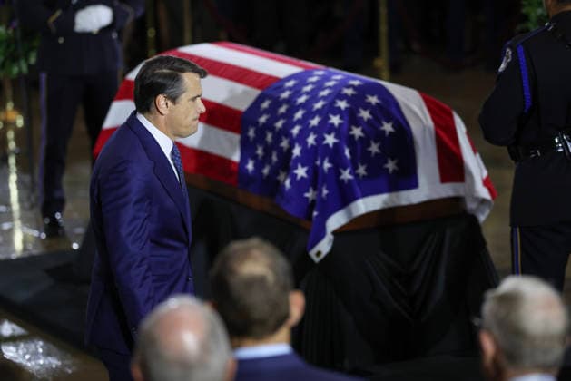 July 28, 2026, Washington, District Of Columbia, USA: WASHINGTON, DC - JULY 28: Acting U.S. Attorney General Todd Blanche pays his respects over the casket during a memorial tribute for the late U.S. Sen. Lindsey Graham (R-SC) in the Rotunda of the U.S. Capitol on July 28, 2026 in Washington, DC. Graham, who was elected to the Senate in 2002, died suddenly on July 11th from an aortic dissection. He was 71 years old Washington USA - ZUMAs152 20260728_faa_s152_136 Copyright: xWinxMcNameex-xPoolxviaxCNPx