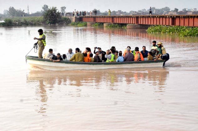 RECORD DATE NOT STATED Rescue officials are busy in relief and rescue operation to help people affected by flash flood due to heavy downpour, at Pathan Colony Tehsil Ferozwala near Lahore on Tuesday, July 28, 2026. Three children from the same family drowned after a canal embankment broke in Ferozwala Pathan Colony, bringing the death toll from ongoing monsoon rains across affected regions to 32, according to the PDMA. (Babar Shah PPI Images). EDITORIAL USE ONLY Copyright: xx AR-ZM-280726x ppiphotos484142