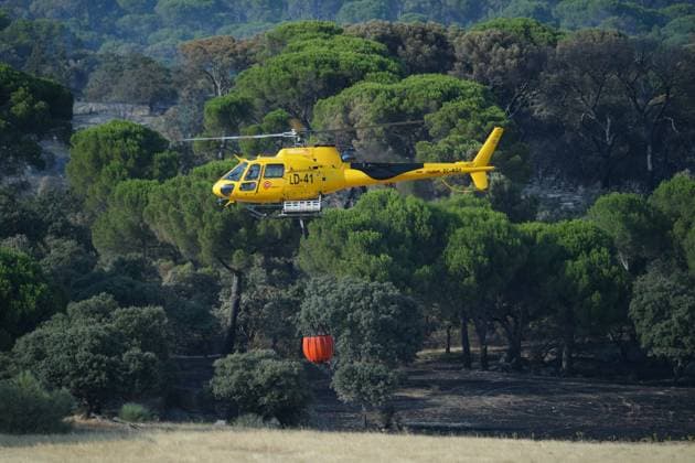 Helicopters help fight fires in San Martin de Valdeiglesias, west of Madrid, Spain, Tuesday, July 28, 2026 Cordon Press 