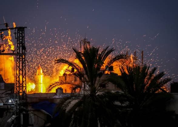 Israeli airstrike destroys mosque, displaced persons’ tents in Gaza City, leaves hundreds homeless GAZA CITY, GAZA, PALESTINE - JULY 28: Dense smoke and flames billow into the sky following an Israeli military airstrike targeting the Al-Muttaqin Mosque and surrounding buildings in the Yarmouk neighborhood of Gaza City, Gaza Strip, Palestine on July 28, 2026. The attack completely destroyed the mosque and adjacent shelters housing displaced Palestinian families, causing widespread destruction and fires across the residential area despite the ongoing ceasefire agreement in the enclave. Saeed M. M. T. Jaras Anadolu Gaza City Gaza. Editorial use only. Please get in touch for any other usage.  Copyright: x2026xAnadoluxSaeedxM.xM.xT.xJarasx