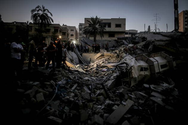 Israeli airstrike destroys mosque, displaced persons’ tents in Gaza City, leaves hundreds homeless GAZA CITY, GAZA, PALESTINE - JULY 28: Palestinians inspect damage following an Israeli military airstrike targeting the Al-Muttaqin Mosque and surrounding buildings in the Yarmouk neighborhood of Gaza City, Gaza Strip, Palestine on July 28, 2026. The attack completely destroyed the mosque and adjacent shelters housing displaced Palestinian families, causing widespread destruction and fires across the residential area despite the ongoing ceasefire agreement in the enclave. Saeed M. M. T. Jaras Anadolu Gaza City Gaza. Editorial use only. Please get in touch for any other usage.  Copyright: x2026xAnadoluxSaeedxM.xM.xT.xJarasx