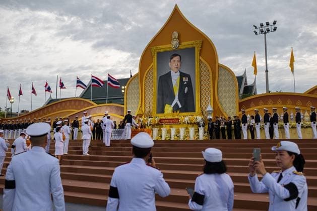 July 28, 2026, Bangkok, Thailand: Thai officials wait for a queue to give their respect in front of a portrait of the King Vajiralongkorn during his 74th birthday celebration..Thai authorities held a celebration to mark the 74th birthday of King Maha Vajiralongkorn at Sanam Luang. Bangkok Thailand  - ZUMAs197 20260728_aaa_s197_089 Copyright: xPeeraponxBoonyakiatx