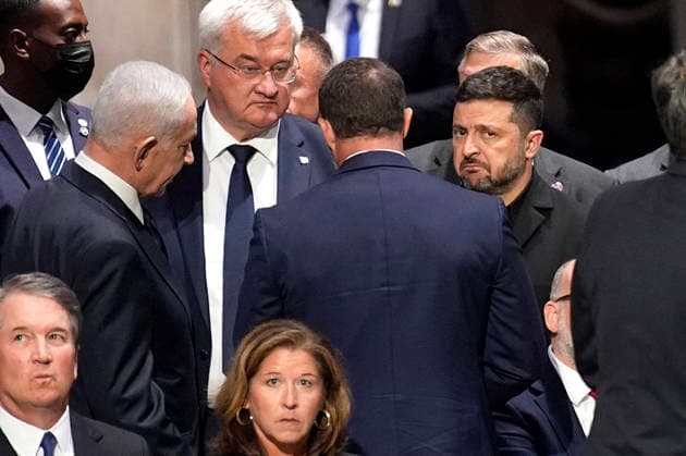 Lindsey Graham funeral service - Washington Ukrainian President Volodymyr Zelensky listens to Prime Minister Benjamin Netanyahu of Israel at the funeral service for Senator Lindsey Graham at Washington National Cathedral in Washington on July 28, 2026. Photo by Yuri Gripas ABACAPRESS.COM Washington DC United States  Copyright: xGripasxYuri ABACAx
