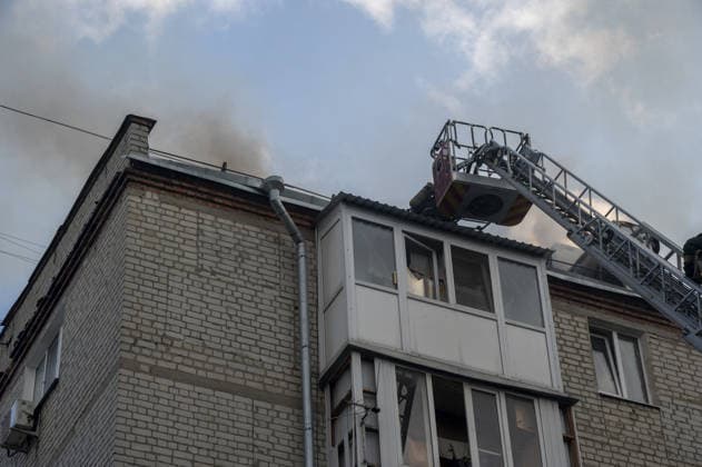 Russian drone attack in Kharkiv KHARKIV, UKRAINE - JULY 28: Russian Shahed type jet-powered UAV struck the roof of a five-story residential building in Kharkiv, Ukraine on July 28, 2026. A fire broke out on the roof, damaging about half of its area. Eight local residents suffered acute stress reactions. In addition, five nearby high-rise buildings were damaged, with windows shattered, as well as private homes and power lines. Serhii Masin Anadolu Kharkiv Ukraine. Editorial use only. Please get in touch for any other usage.  Copyright: x2026xAnadoluxSerhiixMasinx