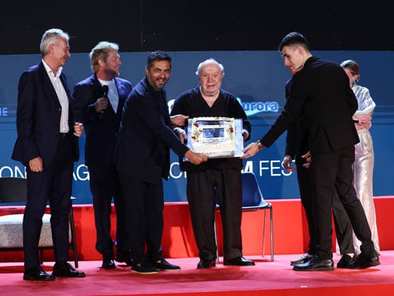 IPA87075687 - Soverato (CZ), 23rd edition of the Magna Graecia Film Festival—fourth night. In the photo: Gianvito Casadonte pays tribute to Lino Banfi with a cake to celebrate the actor’s 90th birthday  Copyright: xMarcoxProvvisionatox xMarcoxProvvisionatox 87075687