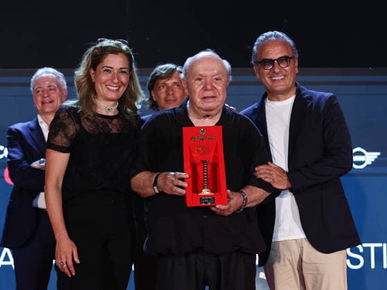IPA87075698 - Soverato (CZ), 23rd edition of the Magna Graecia Film Festival—fourth night. Pictured: Monica and Giuseppe Spadafora and Lino Banfi with the Colonna d Oro  Copyright: xMarcoxProvvisionatox xMarcoxProvvisionatox 87075698