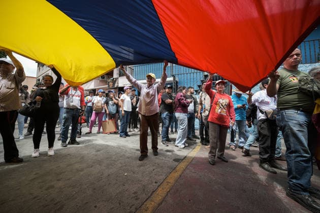 Chavista supporters mark Hugo Chavez s 72nd birth anniversary in Caracas CARACAS, VENEZUELA - JULY 28: Chavista activists and representatives from various state institutions gather at the 23 de Enero housing complex outside the Cuartel de la Montana to commemorate the 72nd birth anniversary of former Venezuelan President Hugo Chavez Frias in Caracas, Venezuela, on July 28, 2026. Caracas Mayor Carmen Melendez and Tachira State Governor Fredy Bernal attended the event. Diko Betancourt Anadolu Caracas Venezuela. Editorial use only. Please get in touch for any other usage.  Copyright: x2026xAnadoluxDikoxBetancourtx