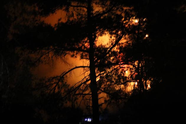 Crews battle forest fire in Antalya’s Kas district KAS, ANTALYA, TURKIYE - JULY 28: Flames and smoke rise from a forest fire as crews continue ground operations into the evening in the Kas district of Antalya, Turkiye, on July 28, 2026. Talip Demirci Anadolu Antalya Turkey. Editorial use only. Please get in touch for any other usage.  Copyright: x2026xAnadoluxTalipxDemircix