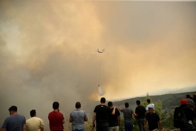 Firefighters battle wildfire in Mugla from air and ground MUGLA, TURKIYE - JULY 29 : Fire extinguishing efforts continue both from the air and land to contain a wildfire in the Seydikemer district of Mugla, Turkiye on July 29, 2026. Ali Riza Akkir Anadolu Mugla Turkey. Editorial use only. Please get in touch for any other usage.  Copyright: x2026xAnadoluxAlixRizaxAkkirx