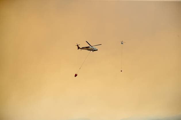 Firefighters battle wildfire in Mugla from air and ground MUGLA, TURKIYE - JULY 29 : Fire extinguishing efforts continue both from the air and land to contain a wildfire in the Seydikemer district of Mugla, Turkiye on July 29, 2026. Ali Riza Akkir Anadolu Mugla Turkey. Editorial use only. Please get in touch for any other usage.  Copyright: x2026xAnadoluxAlixRizaxAkkirx
