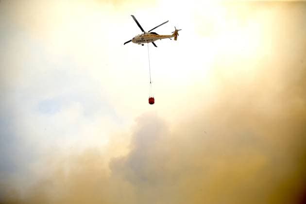Firefighters battle wildfire in Mugla from air and ground MUGLA, TURKIYE - JULY 29 : Fire extinguishing efforts continue both from the air and land to contain a wildfire in the Seydikemer district of Mugla, Turkiye on July 29, 2026. Ali Riza Akkir Anadolu Mugla Turkey. Editorial use only. Please get in touch for any other usage.  Copyright: x2026xAnadoluxAlixRizaxAkkirx
