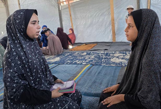 Orphaned Palestinian children attend Quran classes in Khan Younis camp Orphaned Palestinian boys and girls take part in Quran memorization and recitation classes at the Al Baraka Camp for Orphan Care in the al-Mawasi area of Khan Younis, southern Gaza Strip, on July 29, 2026. The educational sessions are held regularly to teach the Quran and strengthen the children s religious knowledge amid the difficult humanitarian conditions in the Gaza Strip. Photo by Tariq Mohammad APA Images Khan Yunis Gaza Strip Palestinian Territory 290726_Khan_Yunis_TM_00(18) Copyright: xapaimagesxTariqxMohammad xapaimagesx