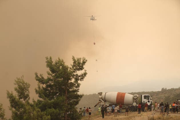 Firefighting efforts continue to contain forest fire in Turkiye s Mugla MUGLA, TURKIYE - JULY 29: Firefighting efforts continue by air and land to contain a forest fire that broke out in Seydikemer district of Mugla, Turkiye, on July 29, 2026. Fatih Hepokur Anadolu Mugla Turkey. Editorial use only. Please get in touch for any other usage.  Copyright: x2026xAnadoluxFatihxHepokurx