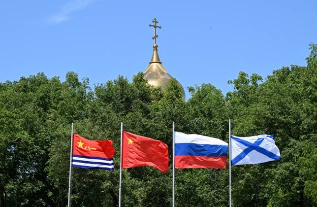 Russia China Naval Drills 9213453 29.07.2026 Russian and Chinese flags are pictured during a ceremony welcoming Russian and Chinese navy ships after joint patrols in the Pacific Ocean upon arrival at the port of Vladivostok, Russia. On July 28, the Russian and Chinese navies completed their sixth joint patrol in the Pacific Ocean, a mission that lasted two weeks. Vitaliy Ankov Sputnik Vladivostok Russia  Copyright: xVitaliyxAnkovx