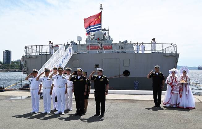 Russia China Naval Drills 9213459 29.07.2026 Russian navy officers and crew members of the Chinese People s Liberation Army Navy guided-missile destroyer Kaifeng line up during a ceremony welcoming Russian and Chinese navy ships after joint patrols in the Pacific Ocean upon arrival at the port of Vladivostok, Russia. On July 28, the Russian and Chinese navies completed their sixth joint patrol in the Pacific Ocean, a mission that lasted two weeks. Vitaliy Ankov Sputnik Vladivostok Russia  Copyright: xVitaliyxAnkovx