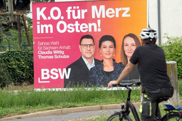 BSW Wahlplakat mit Sahra Wagenknecht, Wahlslogan: K.O. für Merz im Osten!, Wahlkampf in Sachsen-Anhalt, Magdeburg, 28. Juli 2026 Deutschland, Magdeburg, 28. Juli 2026, BSW Wahlplakat mit Sahra Wagenknecht, Wahlslogan: K.O. für Merz im Osten!, mit BSW Kandidaten Claudia Wittig und Thomas Schulze, Landtagswahlen in Sachsen-Anhalt am 6. September, Wahlkampf, Politik, *** BSW campaign poster featuring Sahra Wagenknecht, campaign slogan K.O. for Merz in the East, campaign in Saxony-Anhalt, Magdeburg, July 28, 2026, Germany, Magdeburg, July 28, 2026, BSW election poster featuring Sahra Wagenknecht, campaign slogan K.O. for Merz in the East, with BSW candidates Claudia Wittig and Thomas Schulze, state elections in Saxony-Anhalt on September