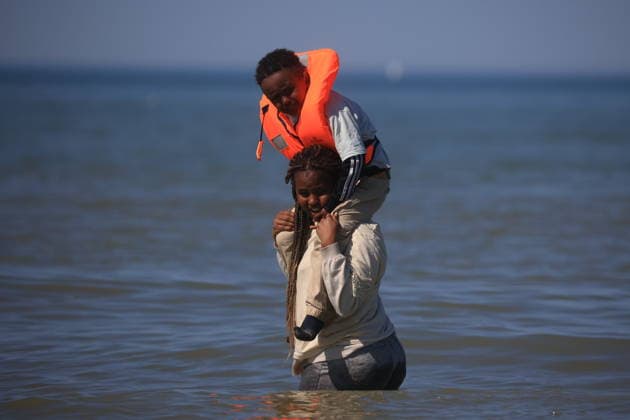 Migrants rescued from water during English Channel crossing attempt in France HARDELOT, FRANCE - JULY 29: Migrants are rescued from the water after attempting to cross the English Channel aboard an inflatable boat at Hardelot-Plage in northern France on July 29, 2026. Marcin Nowak Anadolu Hardelot France. Editorial use only. Please get in touch for any other usage.  Copyright: x2026xAnadoluxMarcinxNowakx
