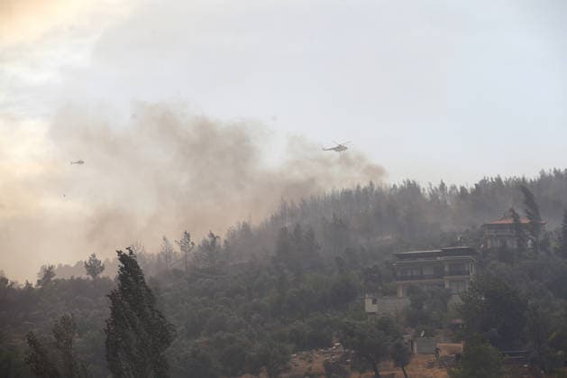 Extinguishing efforts continue for the wildfire broke out in Turkiye s Mugla MUGLA, TURKIYE - JULY 29: Extinguishing efforts continue as smoke rises among the trees after a wildfire broke out in Seydikemer district of Mugla, Turkiye on July 29, 2026. Fatih Hepokur Anadolu Mugla Turkey. Editorial use only. Please get in touch for any other usage.  Copyright: x2026xAnadoluxFatihxHepokurx