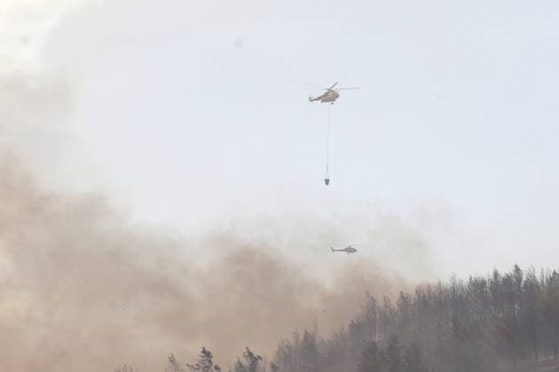 Extinguishing efforts continue for the wildfire broke out in Turkiye s Mugla MUGLA, TURKIYE - JULY 29: Extinguishing efforts continue as smoke rises among the trees after a wildfire broke out in Seydikemer district of Mugla, Turkiye on July 29, 2026. Fatih Hepokur Anadolu Mugla Turkey. Editorial use only. Please get in touch for any other usage.  Copyright: x2026xAnadoluxFatihxHepokurx