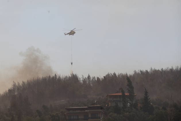 Extinguishing efforts continue for the wildfire broke out in Turkiye s Mugla MUGLA, TURKIYE - JULY 29: Extinguishing efforts continue as smoke rises among the trees after a wildfire broke out in Seydikemer district of Mugla, Turkiye on July 29, 2026. Fatih Hepokur Anadolu Mugla Turkey. Editorial use only. Please get in touch for any other usage.  Copyright: x2026xAnadoluxFatihxHepokurx