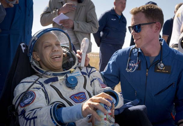 July 29, 2026, Zhezkazgan, Kazakhstan: NASA astronaut Chris Williams speaks with NASA Flight Surgeon James Pavela, right, moments after landing in the Soyuz MS-28 spacecraft, July 26, 2026 near the town of Zhezkazgan, Kazakhstan. Williams landed with cosmonauts Sergei Mikaev and Sergey Kud-Sverchkov, after 241 days in space aboard the International Space Station. Zhezkazgan Kazakhstan - ZUMAp138 20260729_zaa_p138_030 Copyright: xBillxIngalls Nasax