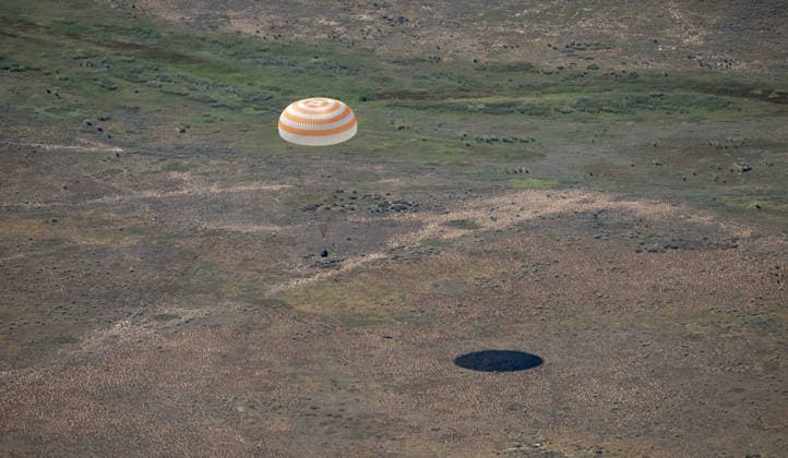 July 29, 2026, Zhezkazgan, Kazakhstan: The Soyuz MS-28 spacecraft descends for touch down on the ground after the journey back from the International Space Station, July 26, 2026 near the town of Zhezkazgan, Kazakhstan. NASA astronaut Chris Williams landed with cosmonauts Sergei Mikaev and Sergey Kud-Sverchkov, after 241 days in space aboard the International Space Station. Zhezkazgan Kazakhstan - ZUMAp138 20260729_zaa_p138_036 Copyright: xBillxIngalls Nasax
