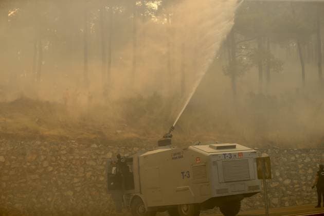 Firefighting efforts continue in Turkiye s Mugla MUGLA, TURKIYE - JULY 29: Firefighters battle the wildfire with ground and aerial operations in Seydikemer district of Mugla, Turkiye on July 29, 2026. Ali Riza Akkir Anadolu Mugla Turkey. Editorial use only. Please get in touch for any other usage.  Copyright: x2026xAnadoluxAlixRizaxAkkirx