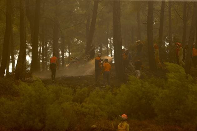 Firefighting efforts continue in Turkiye s Mugla MUGLA, TURKIYE - JULY 29: Firefighters battle the wildfire with ground and aerial operations in Seydikemer district of Mugla, Turkiye on July 29, 2026. Ali Riza Akkir Anadolu Mugla Turkey. Editorial use only. Please get in touch for any other usage.  Copyright: x2026xAnadoluxAlixRizaxAkkirx