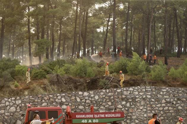 Firefighting efforts continue in Turkiye s Mugla MUGLA, TURKIYE - JULY 29: Firefighters battle the wildfire with ground and aerial operations in Seydikemer district of Mugla, Turkiye on July 29, 2026. Ali Riza Akkir Anadolu Mugla Turkey. Editorial use only. Please get in touch for any other usage.  Copyright: x2026xAnadoluxAlixRizaxAkkirx