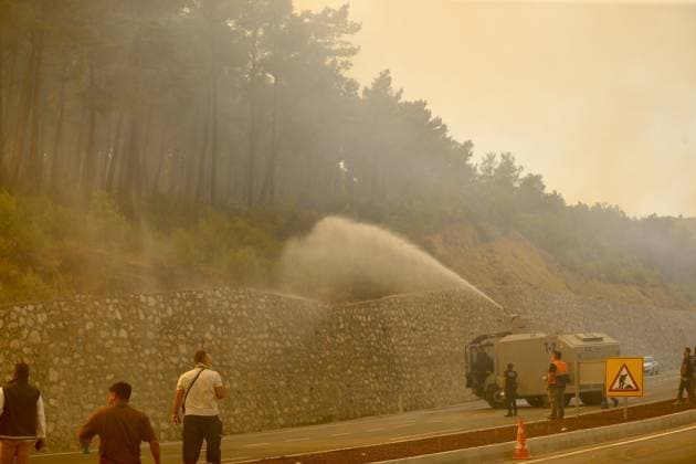 Firefighting efforts continue in Turkiye s Mugla MUGLA, TURKIYE - JULY 29: Firefighters battle the wildfire with ground and aerial operations in Seydikemer district of Mugla, Turkiye on July 29, 2026. Ali Riza Akkir Anadolu Mugla Turkey. Editorial use only. Please get in touch for any other usage.  Copyright: x2026xAnadoluxAlixRizaxAkkirx