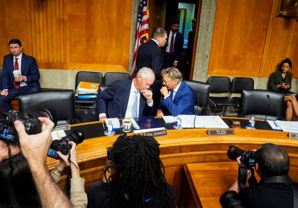 July 29, 2026, Washington, District Of Columbia, USA: United States Senator Rand Paul, MD (Republican of Kentucky), Chair, US Senate Committee on Homeland Security and Governmental Affairs, right, and US Senator Ron Johnson (Republican of Wisconsin), left, converse prior to hearing Dr Anthony Fauci, former Director, National Institute of Allergy and Infectious Diseases at the National Institutes of Health (NIH), testify before the committee in the Dirksen Senate Office Building on Capitol Hill in Washington, DC, USA, on Wednesday, July 29, 2026. Fauci will again face questions about the origins of the COVID-19 pandemic Washington USA - ZUMAs152 20260729_faa_s152_006 Copyright: xAndrewxThomasx
