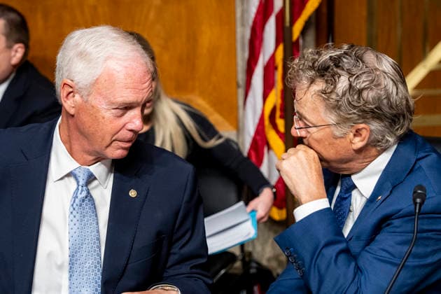 Chairman of the Senate Homeland Security and Governmental Affairs Committee Rand Paul, R-KY, (R) speaks with Sen. Ron Johnson, R-WI, before a hearing with Former Director of the National Institute of Allergy and Infectious Diseases Dr. Anthony Fauci at the U.S. Capitol in Washington, DC on Wednesday, July 29, 2026. Fauci was expected to be questioned about his diary entries during his handling of the Covid-19 pandemic, but invoked his fifth amendment rights.  WAP20260729300 BONNIExCASH
