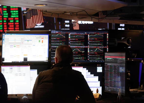 Traders work on the floor of the New York Stock Exchange on Wall Street on Wednesday, July 29, 2026 in New York City. Stocks tumbled for multiple reasons on Wednesday as the central bank chose to keep interest rates unchanged. The Dow Jones Industrial Average closed 1,153 points lower, or 2.2%, for its worst decline since April 2025.  NYP20260729105 JOHNxANGELILLO