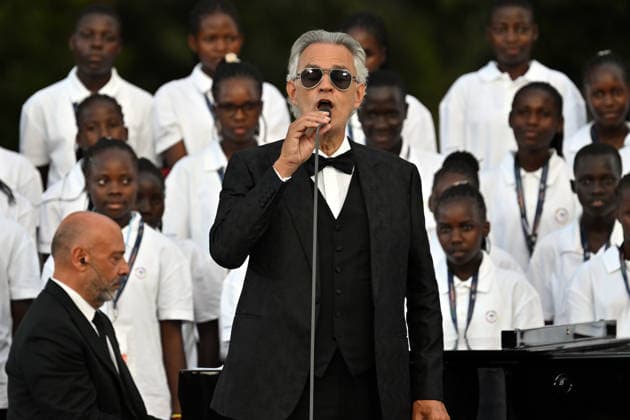 ITALY - POPE LEO XIV DURING A CONCERT IN BORGO LAUDATO SI , A 55-HECTARE EDUCATIONAL AND ENVIRONMENTAL CENTER, AT CASTEL GANDOLFO - 2026 7 29 Italy, Castel Gandolfo , Vatican, 2026 7 29 Italian singer Andrea Bocelli performs during the Canticle of Peace prayer and fraternity meeting with Pope Leo XIV at Borgo Laudato Si in Castel Gandolfo, about 30 kilometers (19 miles) southwest of Rome, Italy. EDITORIAL USE ONLY - NO BOOKS Copyright: xALESSIAxGIULIANIx