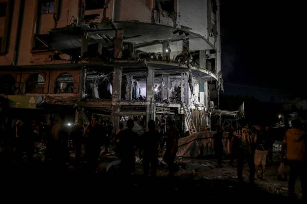 Israeli army continues attacks on civilian homes in Gaza GAZA CITY, GAZA STRIP, PALESTINE - JULY 30: Firefighters respond to a fire in a damaged building near Al-Ahli (Baptist) Hospital after an Israeli strike in eastern Gaza City, Gaza Strip, Palestine on July 30, 2026. According to local sources, the strike targeted the building near the hospital following a renewed ceasefire violation, causing damage and igniting a fire. Saeed M. M. T. Jaras Anadolu Gaza City Gaza. Editorial use only. Please get in touch for any other usage.  Copyright: x2026xAnadoluxSaeedxM.xM.xT.xJarasx