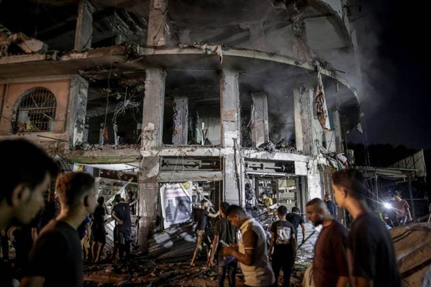 Israeli army continues attacks on civilian homes in Gaza GAZA CITY, GAZA STRIP, PALESTINE - JULY 30: Firefighters respond to a fire in a damaged building near Al-Ahli (Baptist) Hospital after an Israeli strike in eastern Gaza City, Gaza Strip, Palestine on July 30, 2026. According to local sources, the strike targeted the building near the hospital following a renewed ceasefire violation, causing damage and igniting a fire. Saeed M. M. T. Jaras Anadolu Gaza City Gaza. Editorial use only. Please get in touch for any other usage.  Copyright: x2026xAnadoluxSaeedxM.xM.xT.xJarasx