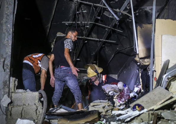 Israeli army continues attacks on civilian homes in Gaza GAZA CITY, GAZA STRIP, PALESTINE - JULY 30: Firefighters respond to a fire in a damaged building near Al-Ahli (Baptist) Hospital after an Israeli strike in eastern Gaza City, Gaza Strip, Palestine on July 30, 2026. According to local sources, the strike targeted the building near the hospital following a renewed ceasefire violation, causing damage and igniting a fire. Saeed M. M. T. Jaras Anadolu Gaza City Gaza. Editorial use only. Please get in touch for any other usage.  Copyright: x2026xAnadoluxSaeedxM.xM.xT.xJarasx