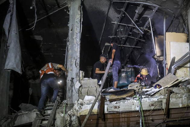 Israeli army continues attacks on civilian homes in Gaza GAZA CITY, GAZA STRIP, PALESTINE - JULY 30: Firefighters respond to a fire in a damaged building near Al-Ahli (Baptist) Hospital after an Israeli strike in eastern Gaza City, Gaza Strip, Palestine on July 30, 2026. According to local sources, the strike targeted the building near the hospital following a renewed ceasefire violation, causing damage and igniting a fire. Saeed M. M. T. Jaras Anadolu Gaza City Gaza. Editorial use only. Please get in touch for any other usage.  Copyright: x2026xAnadoluxSaeedxM.xM.xT.xJarasx