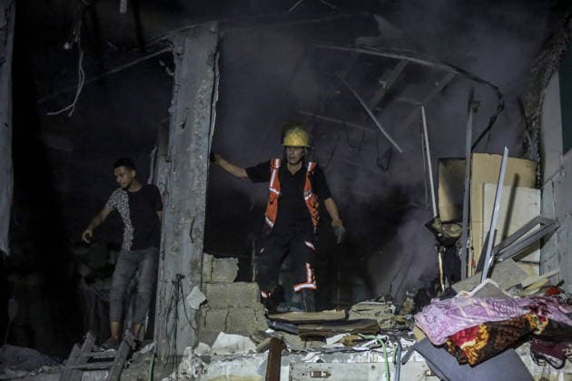 Israeli army continues attacks on civilian homes in Gaza GAZA CITY, GAZA STRIP, PALESTINE - JULY 30: Firefighters respond to a fire in a damaged building near Al-Ahli (Baptist) Hospital after an Israeli strike in eastern Gaza City, Gaza Strip, Palestine on July 30, 2026. According to local sources, the strike targeted the building near the hospital following a renewed ceasefire violation, causing damage and igniting a fire. Saeed M. M. T. Jaras Anadolu Gaza City Gaza. Editorial use only. Please get in touch for any other usage.  Copyright: x2026xAnadoluxSaeedxM.xM.xT.xJarasx