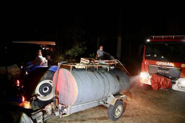 Forest fire breaks out in Mugla s Fethiye MUGLA, TURKIYE - JULY 30: Firefighting teams respond to a forest fire in the Fethiye district of Mugla, Turkiye, on July 30, 2026. Strong winds in the area caused the flames to spread rapidly as efforts to contain the blaze continued. Ali Riza Akkir Anadolu Mugla Turkey. Editorial use only. Please get in touch for any other usage.  Copyright: x2026xAnadoluxAlixRizaxAkkirx