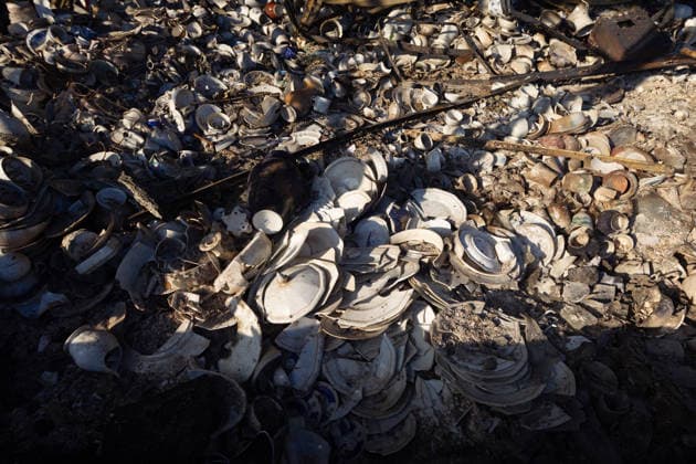 Shattered tableware is on the ground at the Antykar market in Obolonskyi district, which caught fire as a result of an overnight Russian missile strike, Kyiv, Ukraine, July 30, 2026. Debris fell on the market near the Pochaina metro station, igniting trading pavilions. The blaze covered an area of about 100 square metres. Traders’ goods were destroyed, leaving only burnt-out metal structures at the site. (Photo by Kyrylo Chubotin Ukrinform) Market in Kyiv catches fire due to overnight Russian attack  Copyright: xKyryloxChubotinx