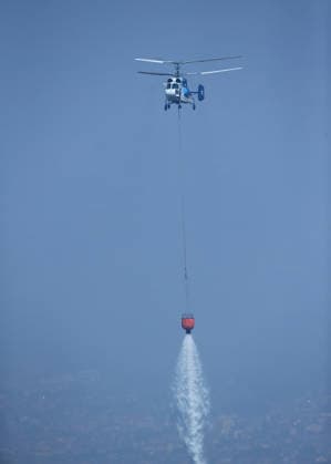 Firefighters battle wildfire in Mugla from air and ground MUGLA, TURKIYE - JULY 30 : Fire extinguishing efforts continue both from the air and land to contain a wildfire in the Seydikemer district of Mugla, Turkiye on July 30, 2026. Mahmut Serdar Alakus Anadolu Mugla Turkey. Editorial use only. Please get in touch for any other usage.  Copyright: x2026xAnadoluxMahmutxSerdarxAlakusx