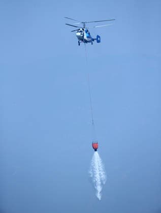 Firefighters battle wildfire in Mugla from air and ground MUGLA, TURKIYE - JULY 30 : Fire extinguishing efforts continue both from the air and land to contain a wildfire in the Seydikemer district of Mugla, Turkiye on July 30, 2026. Mahmut Serdar Alakus Anadolu Mugla Turkey. Editorial use only. Please get in touch for any other usage.  Copyright: x2026xAnadoluxMahmutxSerdarxAlakusx