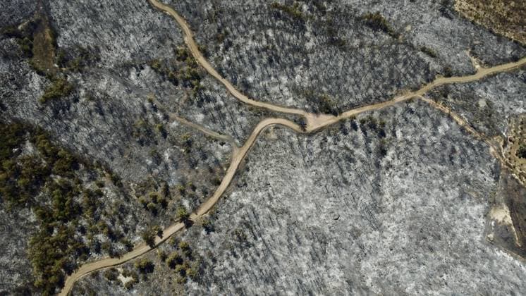 Aerial ciew reveals wildfire damage in Kumluca, Antalya ANTALYA, TURKIYE - JULY 30: An aerial view shows forested areas and buildings damaged by a wildfire that was brought under control in the Kumluca district of Antalya, on July 30, 2026 in Antalya, Turkiye. The fire left large areas of vegetation scorched and caused damage to properties in the affected region. Kasim Sakalli Anadolu Antalya Turkey. Editorial use only. Please get in touch for any other usage.  Copyright: x2026xAnadoluxKasimxSakallix
