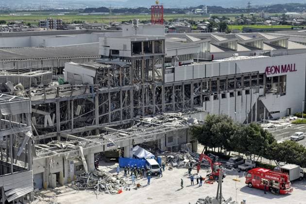 Aftermath of strong earthquake in Kumamoto Photo taken from a drone on July 30, 2026, shows search and rescue operations continuing at the Aeon Mall building in Kashima, Kumamoto Prefecture, two days after it was heavily damaged by an explosion triggered by a gas leak following a powerful earthquake that hit the southwestern Japan prefecture.  A14AA0005624619P