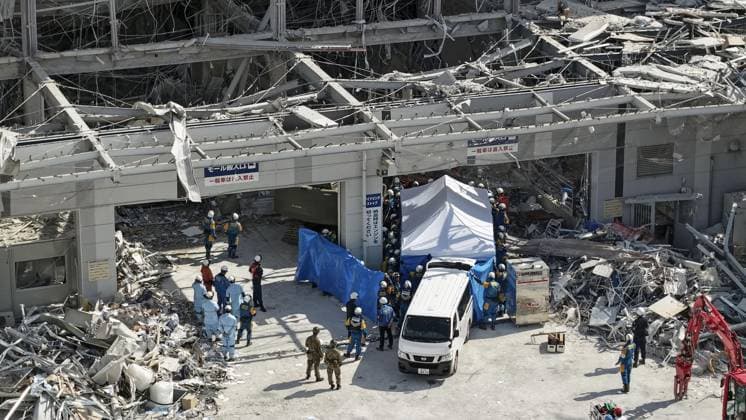 Aftermath of strong earthquake in Kumamoto Photo taken from a drone on July 30, 2026, shows search and rescue operations continuing at the Aeon Mall building in Kashima, Kumamoto Prefecture, two days after it was heavily damaged by an explosion triggered by a gas leak following a powerful earthquake that hit the southwestern Japan prefecture.  A14AA0005624621P