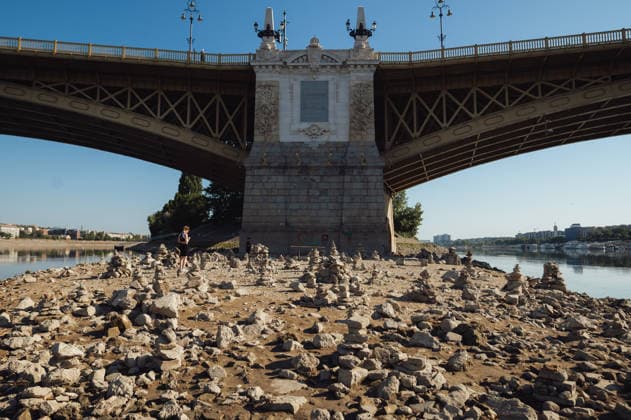 Rived Danube reaches historic record low levels in Budapest BUDAPEST, HUNGARY - JULY 30: A view of the Danube River as it reaches historic record-low water levels in Budapest, Hungary, on July 30, 2026. Following weeks of extreme heat and prolonged drought, the receding river has exposed large sections of the riverbed, rocks and sandbars along the capital s waterfront. The unusually low water levels have disrupted river navigation and highlighted the impact of persistent dry weather across Central Europe. Robert Nemeti Anadolu Budapest Hungary. Editorial use only. Please get in touch for any other usage.  Copyright: x2026xAnadoluxRobertxNemetix